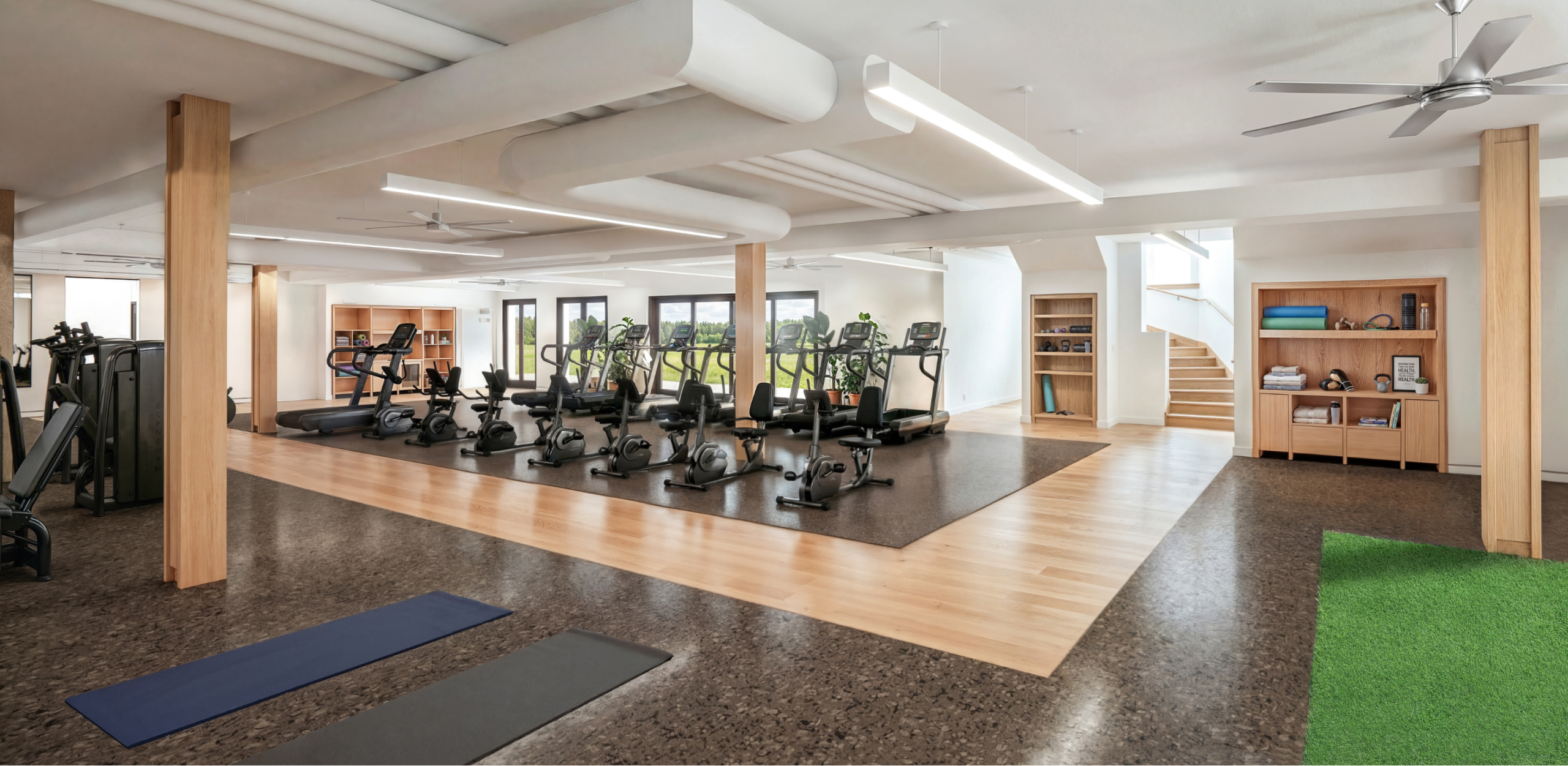 Spacious fitness center with treadmills, stationary bikes, strength machines, and natural wood accents.